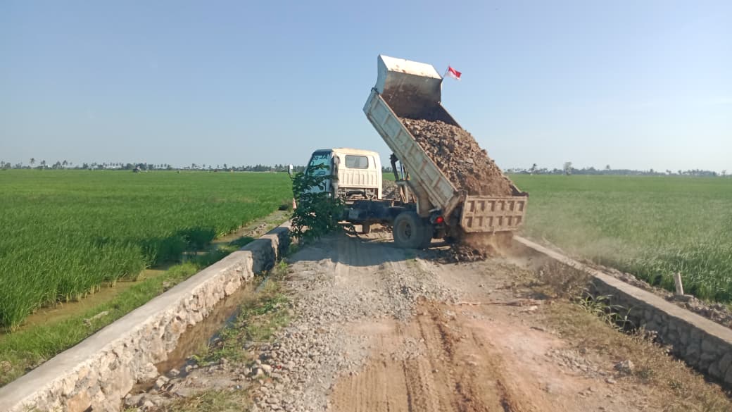 Progres Pekerjaan Jalan Tani TMMD Ke-129 Kodim 1404/Pinrang Kini Tahap Penyelesaian.